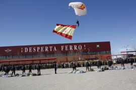 The final paratrooper bears the Flag of Spain