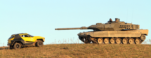 The Leopard 2E facing a Fornasari buggy