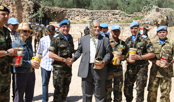 General Conde during the delivery of the olive trees