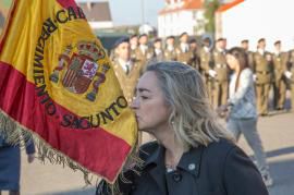Kissing the Flag of Spain after pledging allegiance