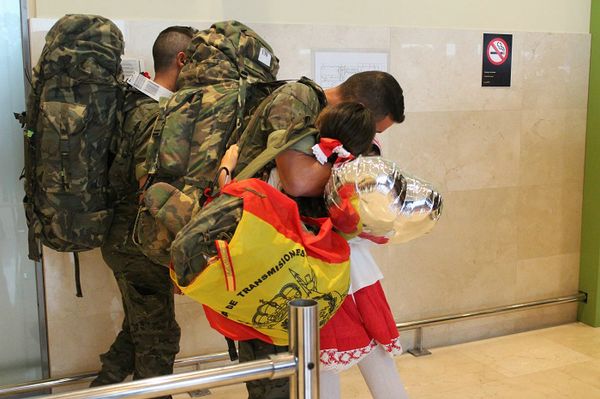 Showing affection after their arrival at the airport