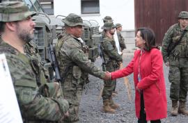The Minister greets a soldier at the General Headquarters
