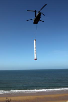 The Chinook begins transporting the rocket