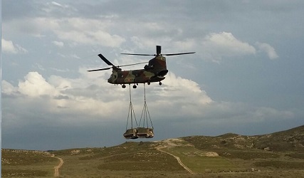 Helicóptero HT-17 Chinook transporta TOM en el CENAD de San Gregorio.