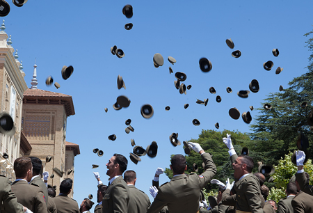 Newly-graduated Lieutenants throw their caps into the air upon graduation